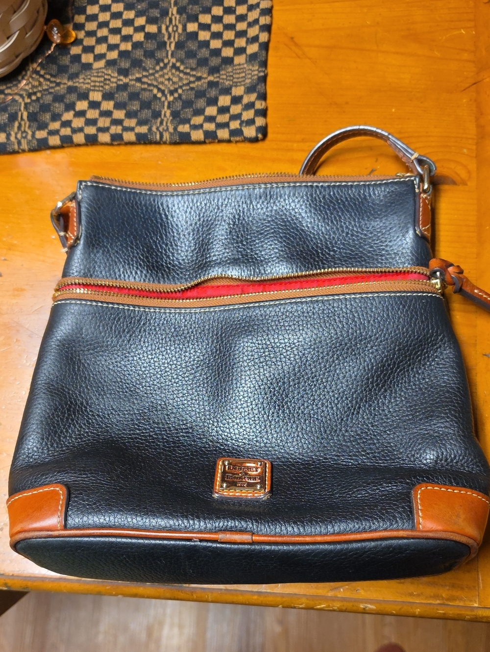 Dooney & Bourke Black Pebbled Leather Messenger with Tan Trim and Red Interior